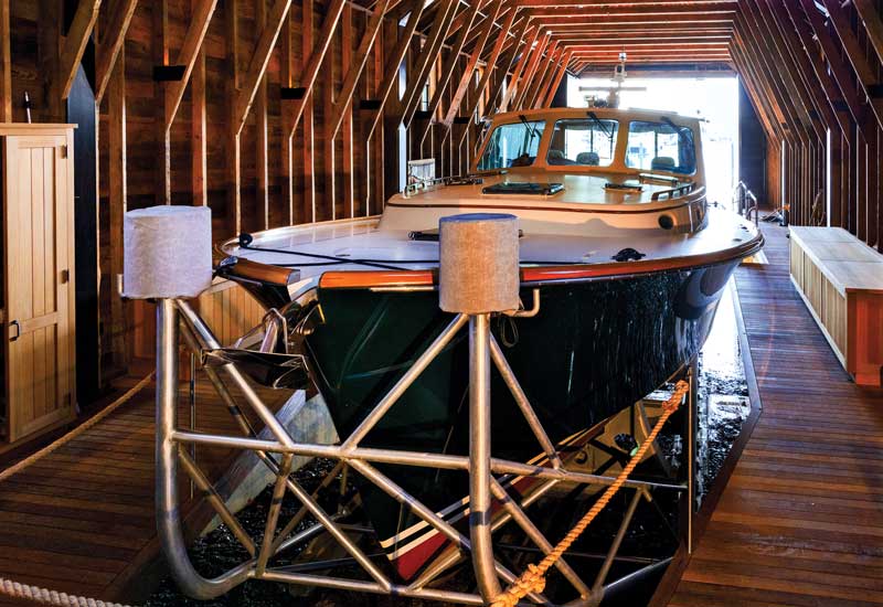 The boat on its cradle inside the boat basin.