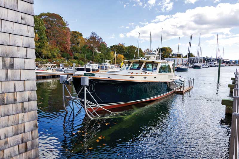 There is enough water in the boat basin and depth at the bottom of the marine railway to launch or land the boat at between mid- and high tide.