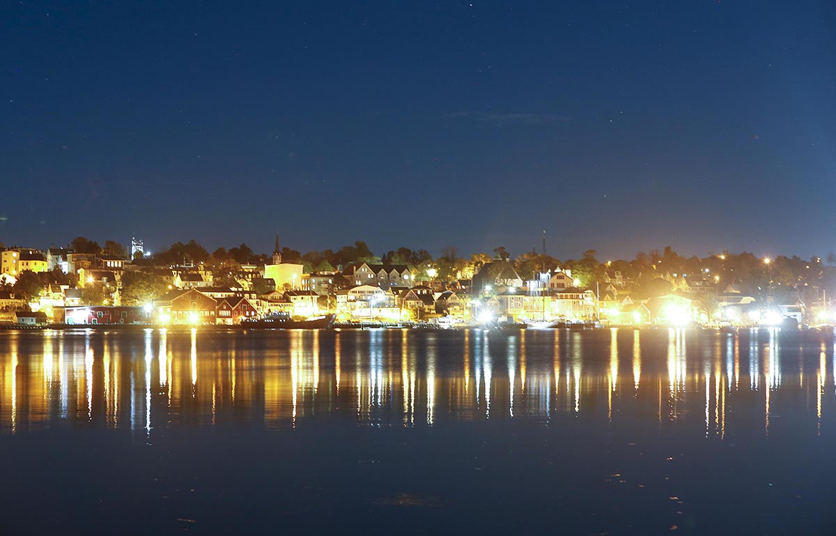 In the past fishermen’s wives kept their home lights burning for returning family members. Today, the harbor remains aglow at night.