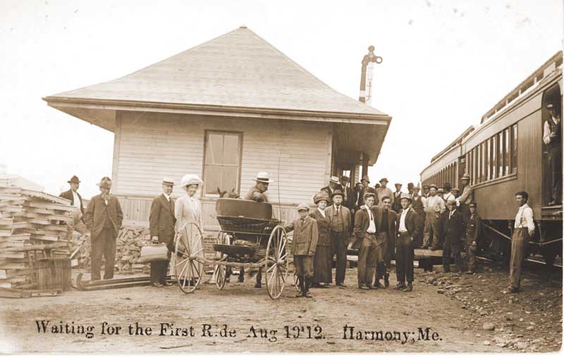 A crowd turned out to board the first passenger train to arrive in Harmony in August, 1912. Courtesy of the Maine Historic Preservation Commission